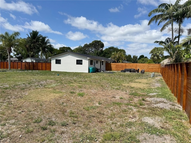 1021 NE 110th St, Biscayne Park, FL 33161 - view of yard featuring a fenced backyard