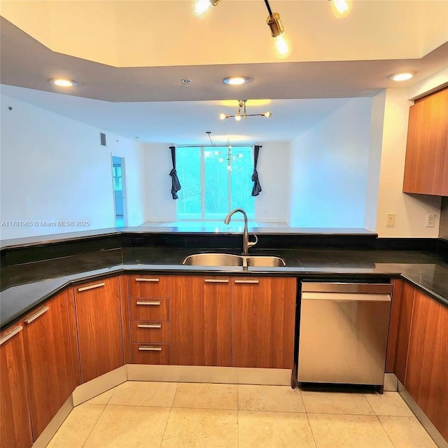 14951 Royal Oaks Ln Unit 203, North Miami, FL 33181 - kitchen with brown cabinetry, recessed lighting, dishwasher, a sink, and dark countertops