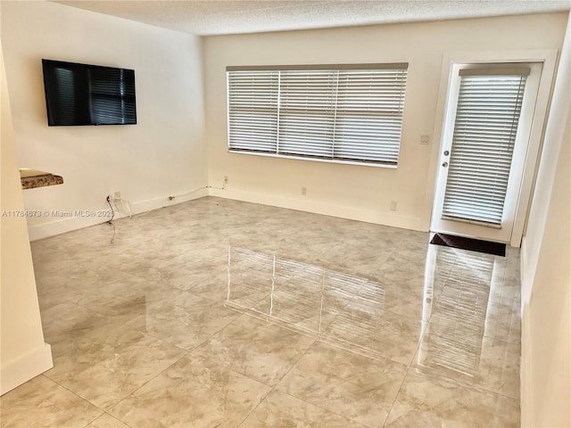 900 Atlantic Shores Blvd Unit 126, Hallandale Beach, FL 33009 - spare room with tile patterned flooring