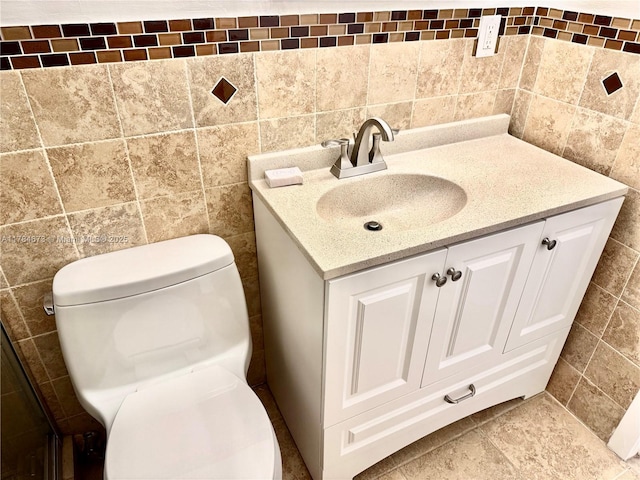 900 Atlantic Shores Blvd Unit 126, Hallandale Beach, FL 33009 - bathroom with tile walls, vanity, and toilet