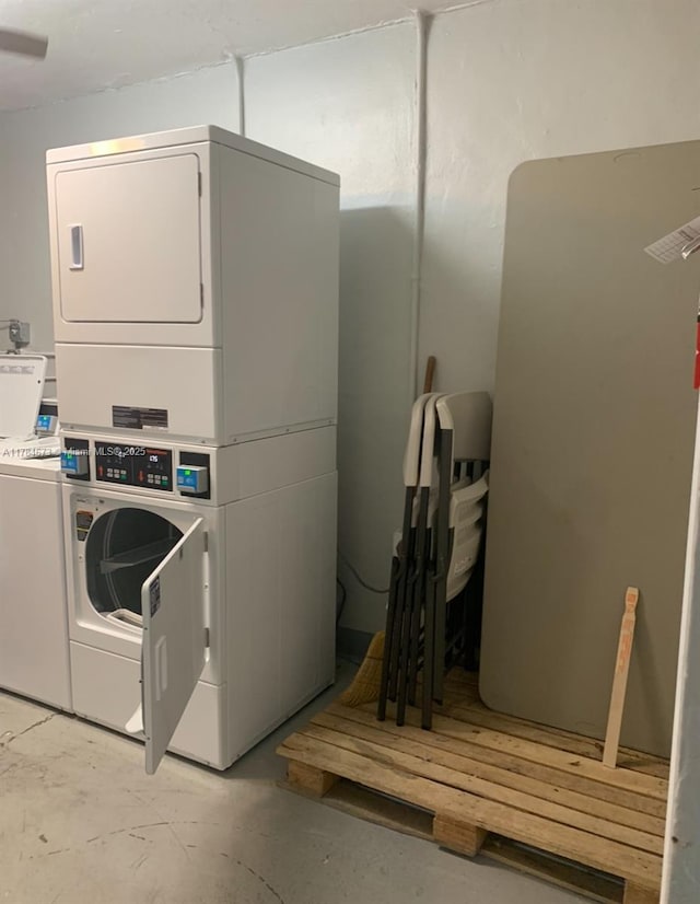 900 Atlantic Shores Blvd Unit 126, Hallandale Beach, FL 33009 - communal laundry room with stacked washing machine and dryer