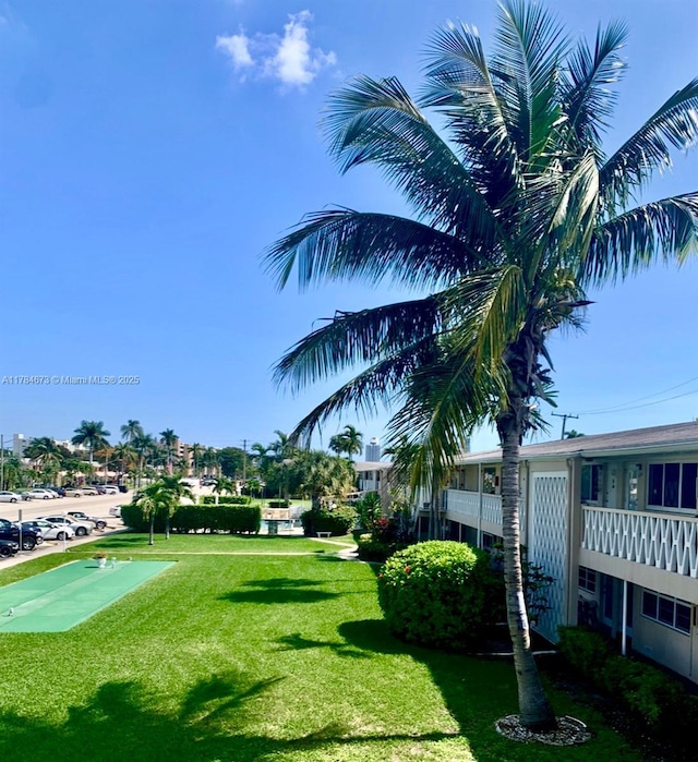 900 Atlantic Shores Blvd Unit 126, Hallandale Beach, FL 33009 - view of community featuring an area to practice putting and a yard