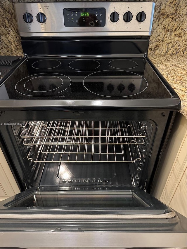 900 Atlantic Shores Blvd Unit 126, Hallandale Beach, FL 33009 - kitchen view of electric range and tasteful backsplash