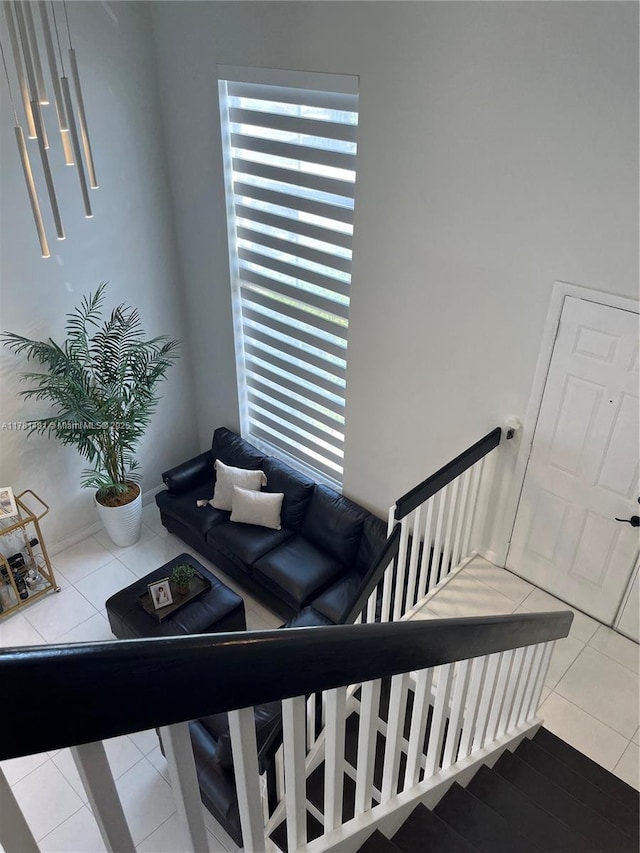 stairs with tile patterned floors