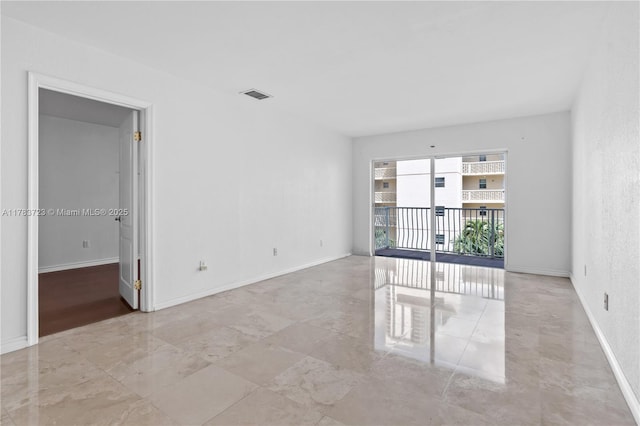 677 NE 24th St Unit 504, Miami, FL 33137 - empty room featuring baseboards