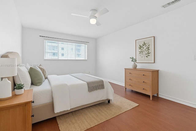 677 NE 24th St Unit 504, Miami, FL 33137 - bedroom featuring wood finished floors and a ceiling fan