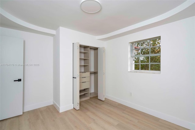13912 SW 103rd Ln, Miami, FL 33186 - unfurnished bedroom with light wood finished floors and baseboards