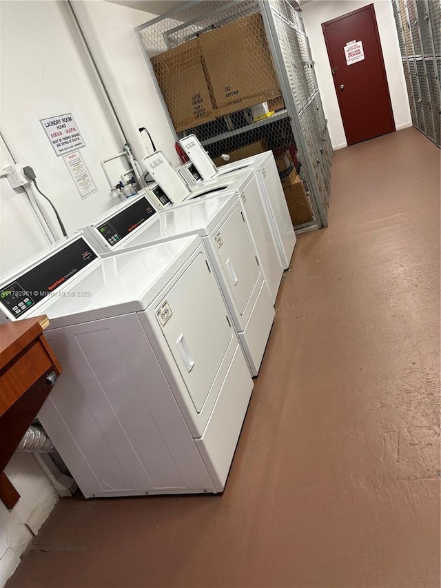 shared laundry area featuring independent washer and dryer