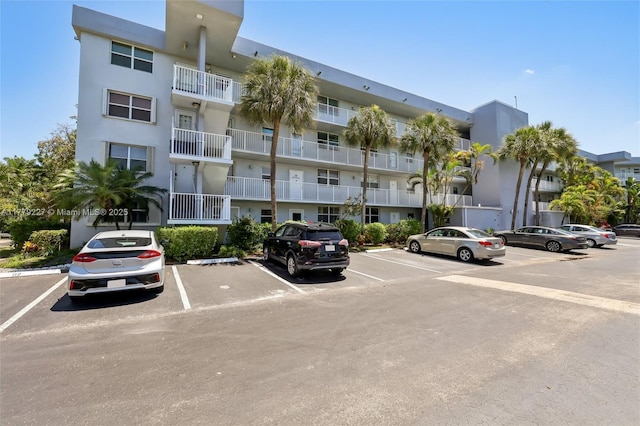 101 Royal Park Dr Unit 1D, Oakland Park, FL 33309 - view of building exterior with uncovered parking