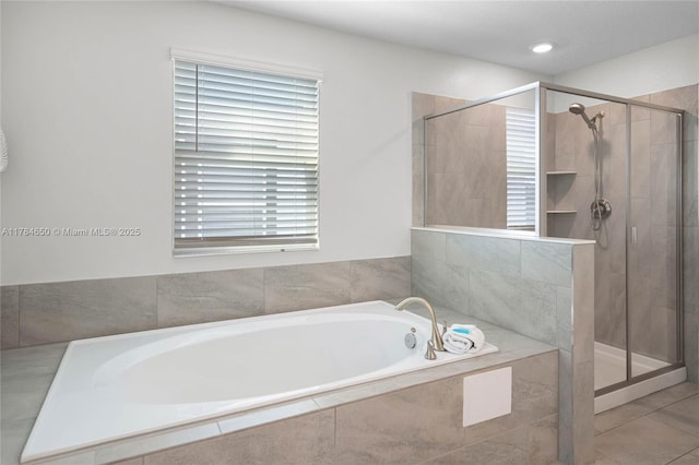 690 Drop, Shot, FL 33896 - full bath featuring a shower stall and a garden tub