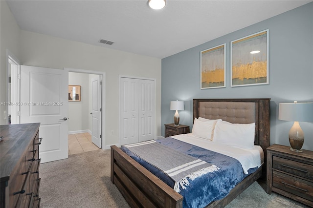 690 Drop, Shot, FL 33896 - tiled bedroom with a closet, baseboards, visible vents, and carpet floors