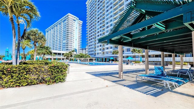 300 Bayview Dr Unit 206, Sunny Isles Beach, FL 33160 - view of patio with a community pool