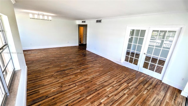 300 Bayview Dr Unit 206, Sunny Isles Beach, FL 33160 - unfurnished room with ornamental molding, dark wood-style floors, french doors, and baseboards