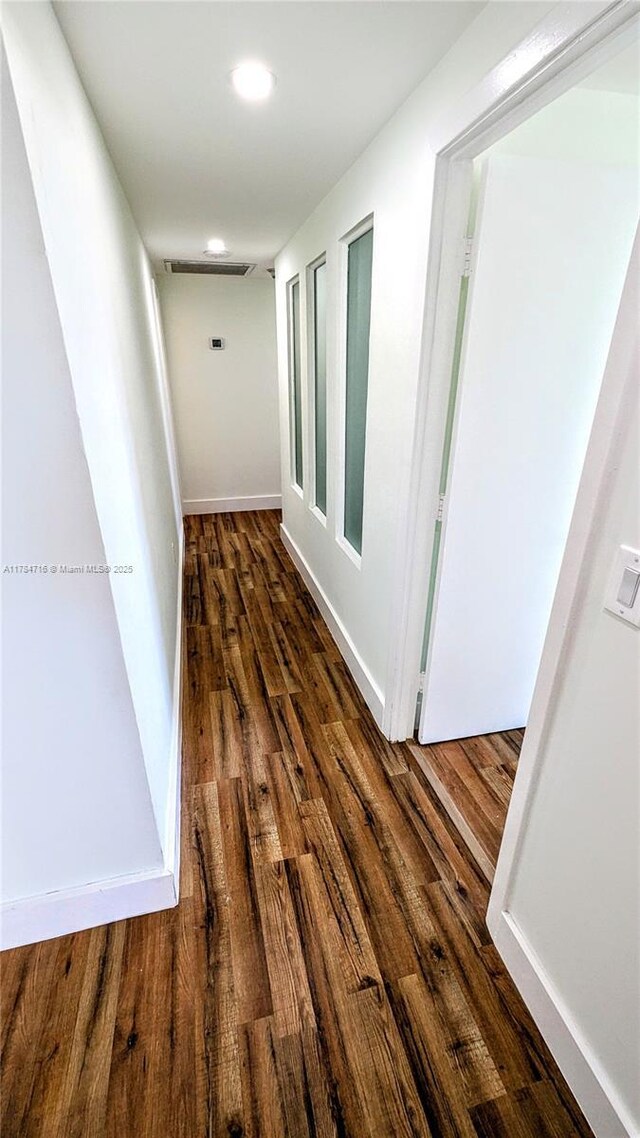 300 Bayview Dr Unit 206, Sunny Isles Beach, FL 33160 - hall featuring dark wood finished floors and recessed lighting