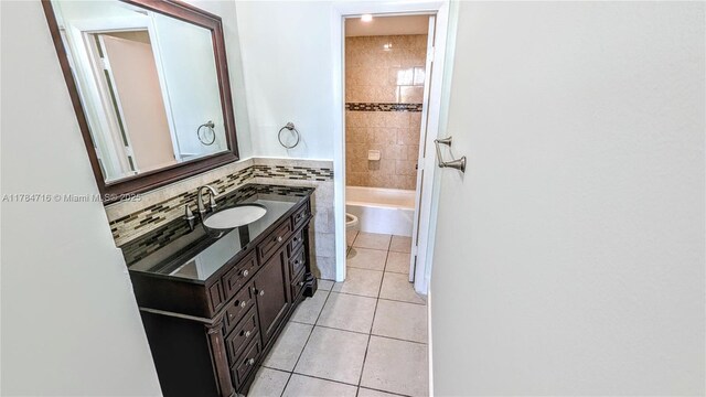 300 Bayview Dr Unit 206, Sunny Isles Beach, FL 33160 - full bath with tile patterned flooring, vanity, toilet, and  shower combination