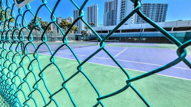 300 Bayview Dr Unit 206, Sunny Isles Beach, FL 33160 - view of tennis court with a city view