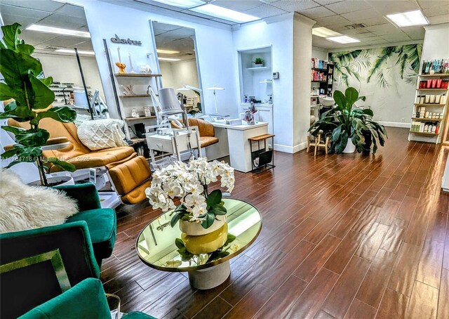 300 Bayview Dr Unit 206, Sunny Isles Beach, FL 33160 - living area featuring a drop ceiling, dark wood-style floors, and baseboards