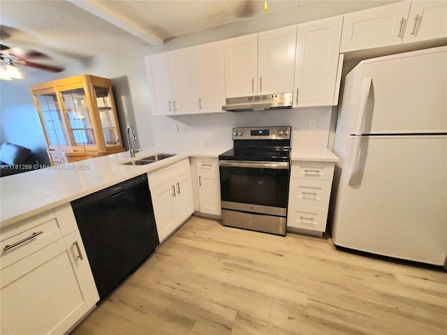 16750 NE 10th Ave Unit 326, North Miami Beach, FL 33162 - kitchen featuring freestanding refrigerator, stainless steel electric range, a sink, black dishwasher, and under cabinet range hood