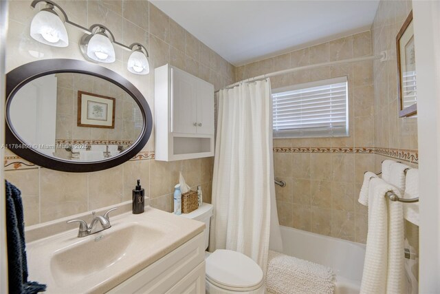 920 SW 10th Ter Unit 12Ar, Hallandale Beach, FL 33009 - bathroom featuring shower / bath combo, tasteful backsplash, vanity, tile walls, and toilet