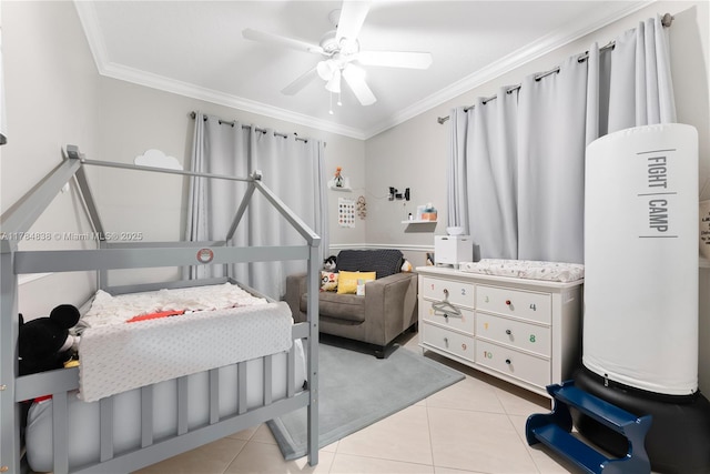 bedroom featuring tile patterned floors, a ceiling fan, and ornamental molding