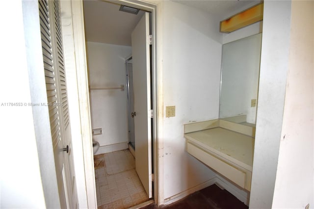 bathroom with visible vents and toilet