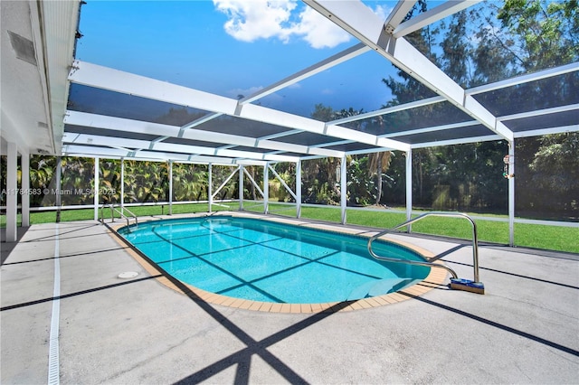 17746 48th Ct N, Loxahatchee, FL 33470 - outdoor pool featuring a patio, glass enclosure, and a yard