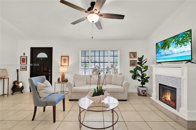 17746 48th Ct N, Loxahatchee, FL 33470 - living area with a ceiling fan, a stone fireplace, and light tile patterned floors