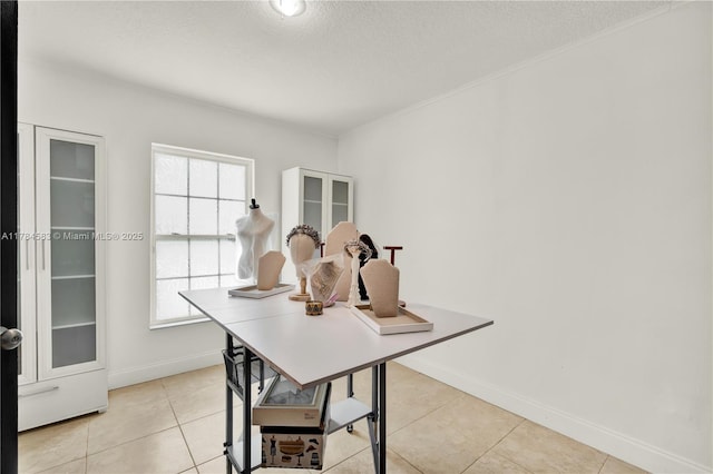 17746 48th Ct N, Loxahatchee, FL 33470 - dining area with a textured ceiling, light tile patterned floors, and ornamental molding