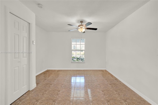 17746 48th Ct N, Loxahatchee, FL 33470 - spare room with a smoke detector, a ceiling fan, and light tile patterned flooring