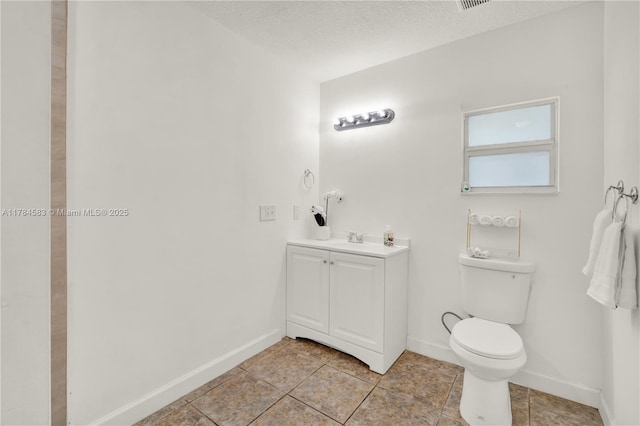 17746 48th Ct N, Loxahatchee, FL 33470 - bathroom featuring vanity, tile patterned flooring, and a textured ceiling