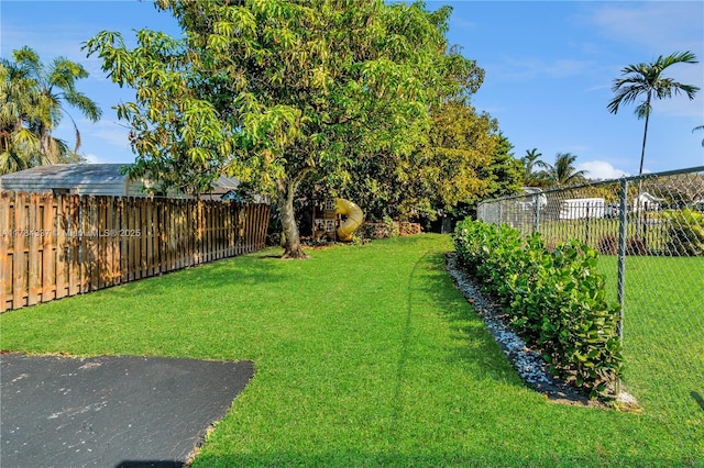 view of yard featuring fence