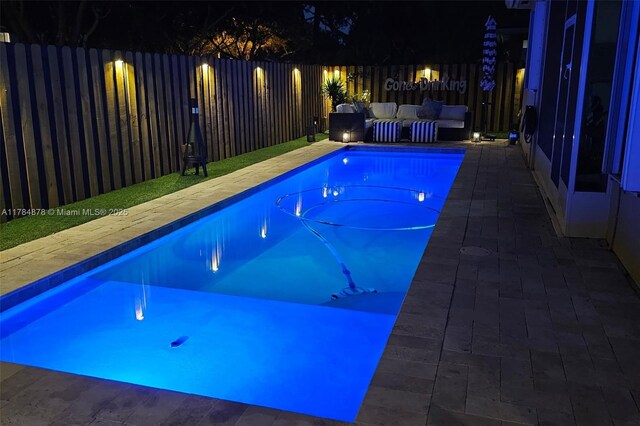 2021 SE 17th Ave, Homestead, FL 33035 - view of pool featuring an outdoor living space and a fenced backyard