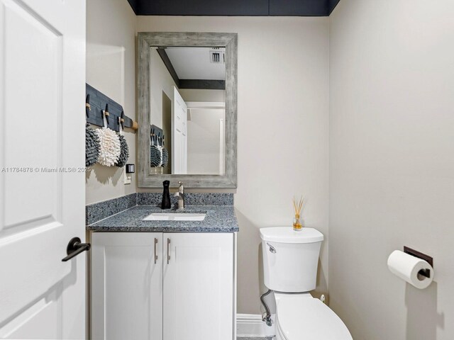 2021 SE 17th Ave, Homestead, FL 33035 - half bath featuring toilet and vanity