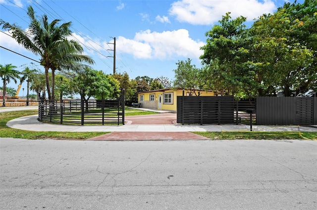 31600 SW 187th Ave, Homestead, FL 33030 - view of community featuring fence, a gate, and a yard