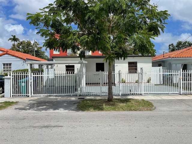 271 NW 57th Ct, Miami, FL 33126 - view of gate featuring a fenced front yard