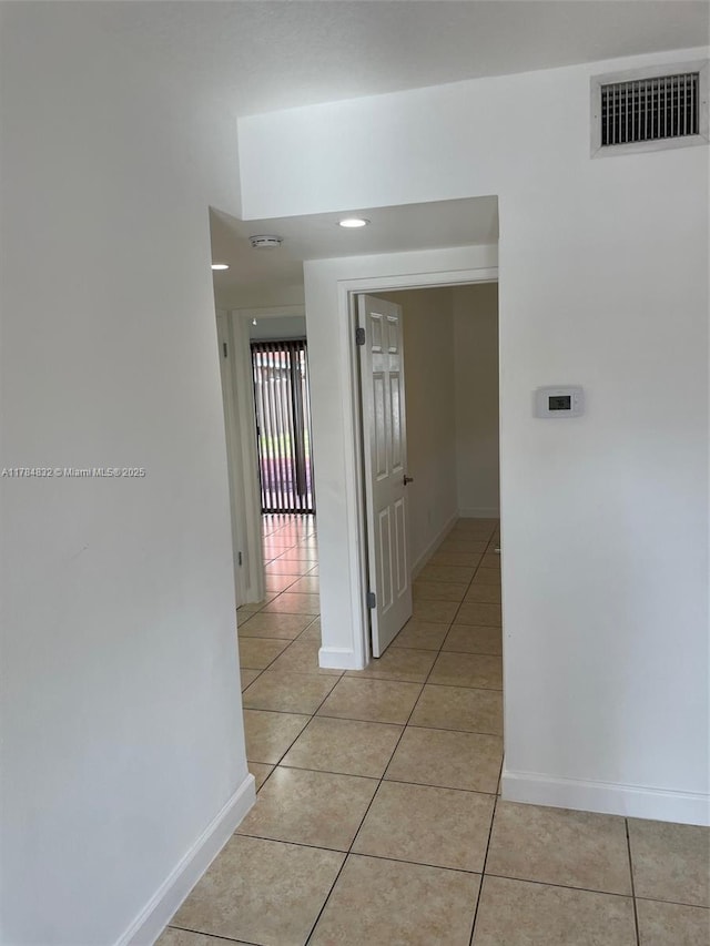 271 NW 57th Ct, Miami, FL 33126 - hall featuring visible vents, baseboards, and light tile patterned flooring