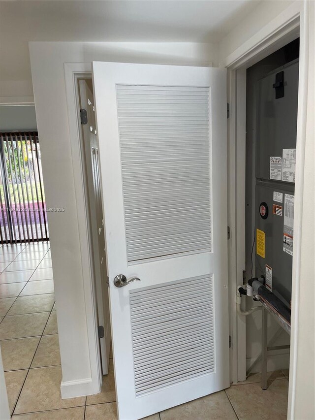 271 NW 57th Ct, Miami, FL 33126 - doorway with light tile patterned floors