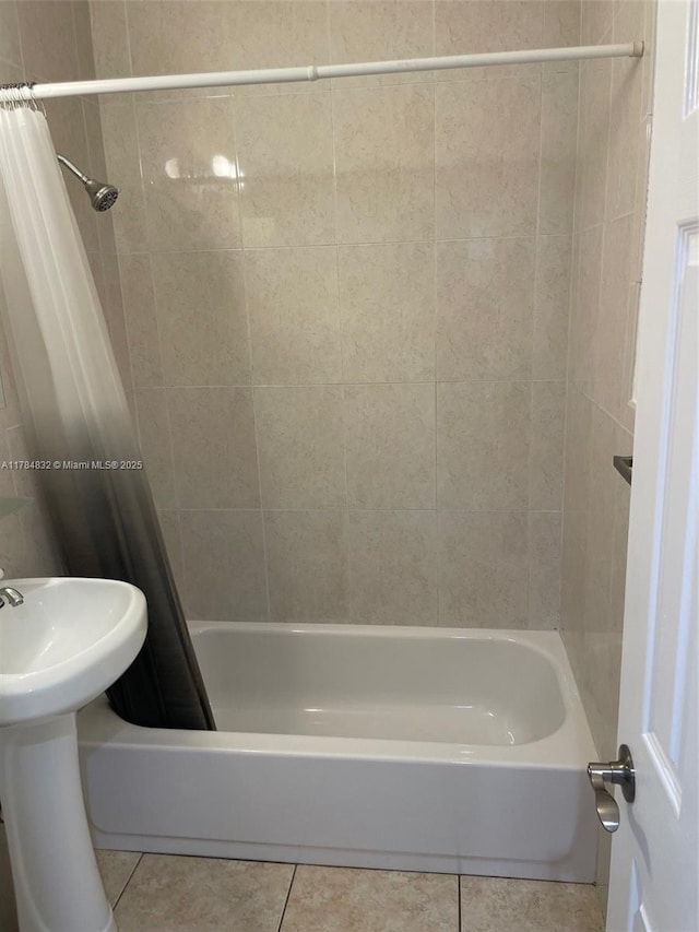 271 NW 57th Ct, Miami, FL 33126 - full bathroom featuring shower / tub combo and tile patterned flooring