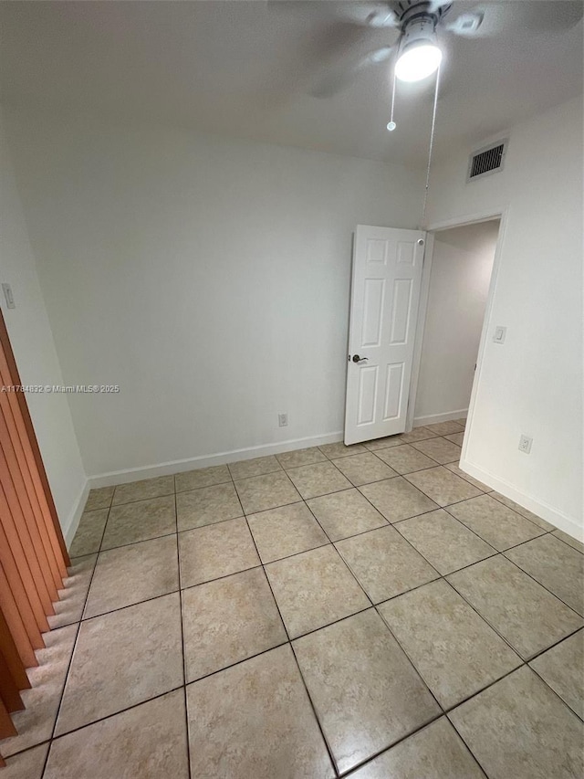 271 NW 57th Ct, Miami, FL 33126 - spare room featuring visible vents, baseboards, a ceiling fan, and light tile patterned flooring