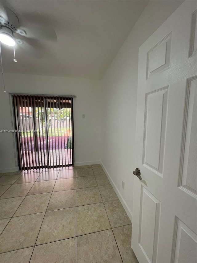 271 NW 57th Ct, Miami, FL 33126 - unfurnished room featuring light tile patterned flooring, baseboards, and a ceiling fan