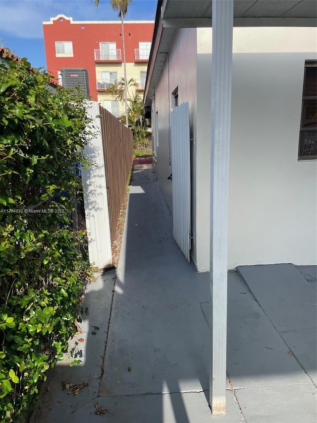 271 NW 57th Ct, Miami, FL 33126 - view of side of home featuring fence