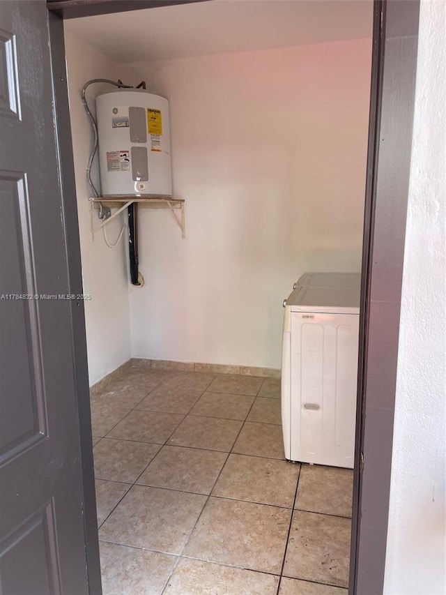 271 NW 57th Ct, Miami, FL 33126 - clothes washing area featuring light tile patterned floors, washer / dryer, and laundry area