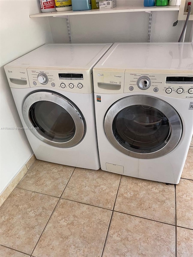 271 NW 57th Ct, Miami, FL 33126 - clothes washing area with laundry area, washing machine and dryer, and tile patterned floors