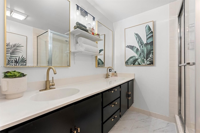 bathroom featuring a stall shower, marble look tiles, double vanity, and baseboards