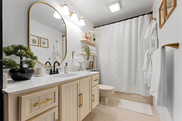 7707 77th Way, West Palm Beach, FL 33407 - bathroom with tile patterned flooring, toilet, and vanity