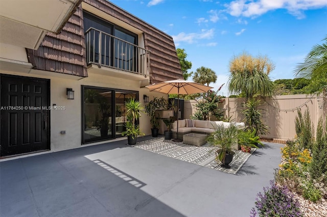 7707 77th Way, West Palm Beach, FL 33407 - view of patio / terrace featuring an outdoor hangout area
