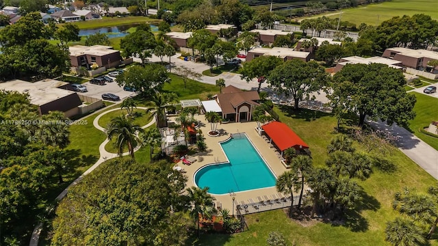 7707 77th Way, West Palm Beach, FL 33407 - aerial overview of property's location featuring a pool and a nearby body of water