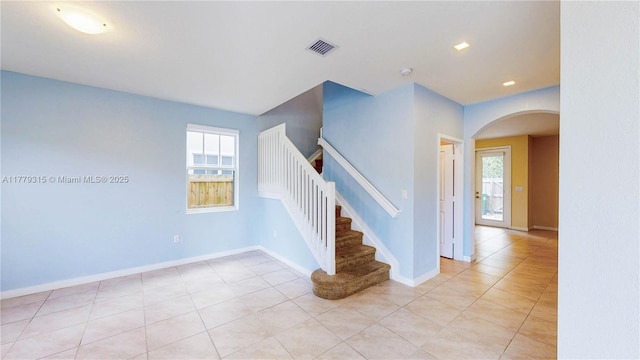24362 SW 117th Path, Homestead, FL 33032 - stairs with visible vents, arched walkways, tile patterned floors, and a healthy amount of sunlight