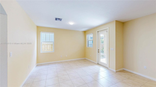 24362 SW 117th Path, Homestead, FL 33032 - empty room with baseboards, light tile patterned flooring, and visible vents