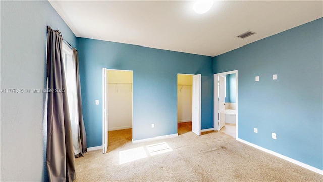 24362 SW 117th Path, Homestead, FL 33032 - unfurnished bedroom featuring baseboards, carpet flooring, connected bathroom, and visible vents